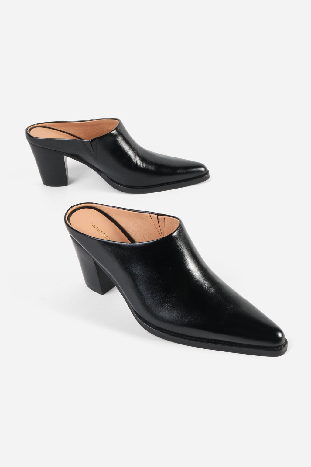 "INTENTIONALLY __________." Eden Leather Heeled Mule - Black