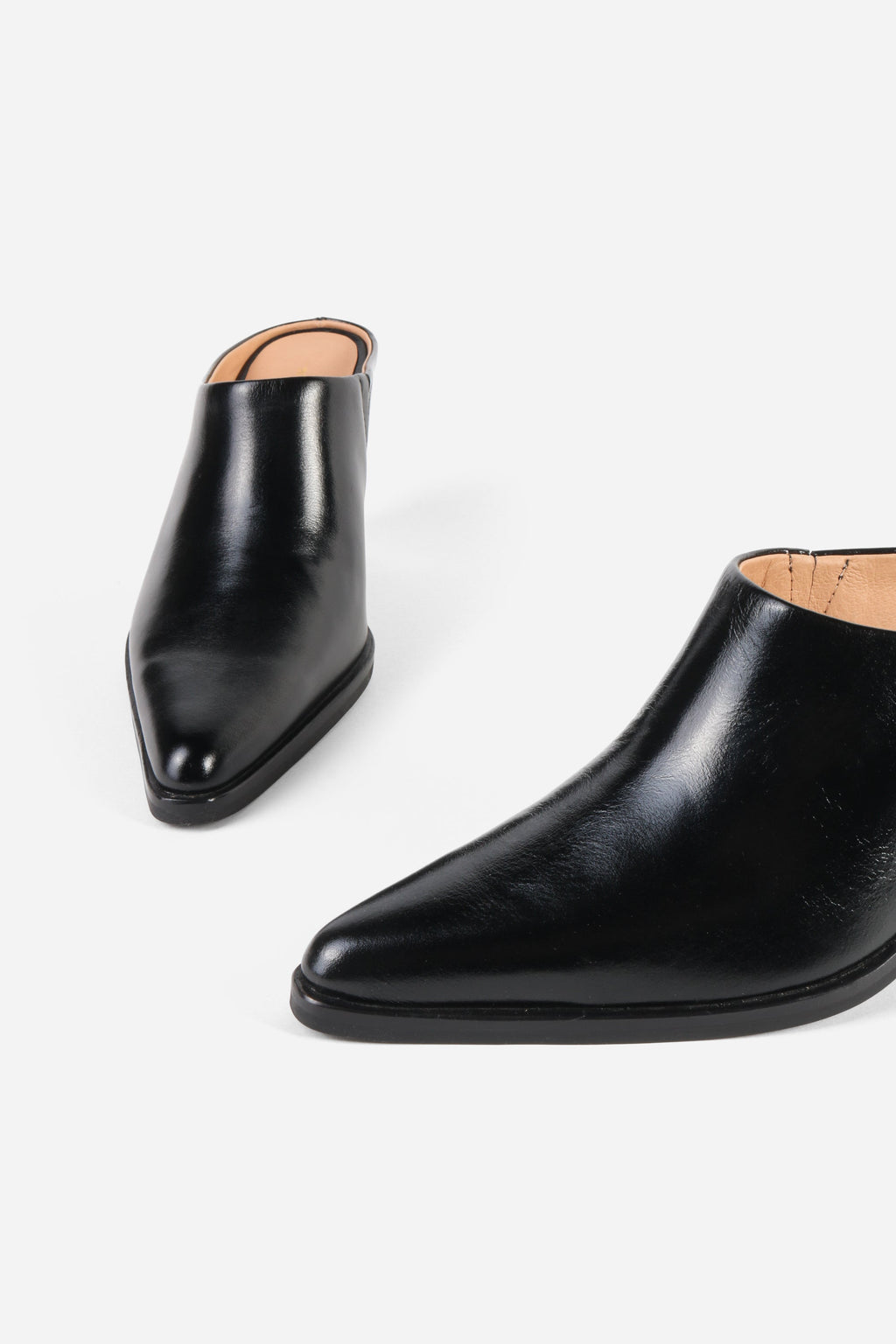 "INTENTIONALLY __________." Eden Leather Heeled Mule - Black