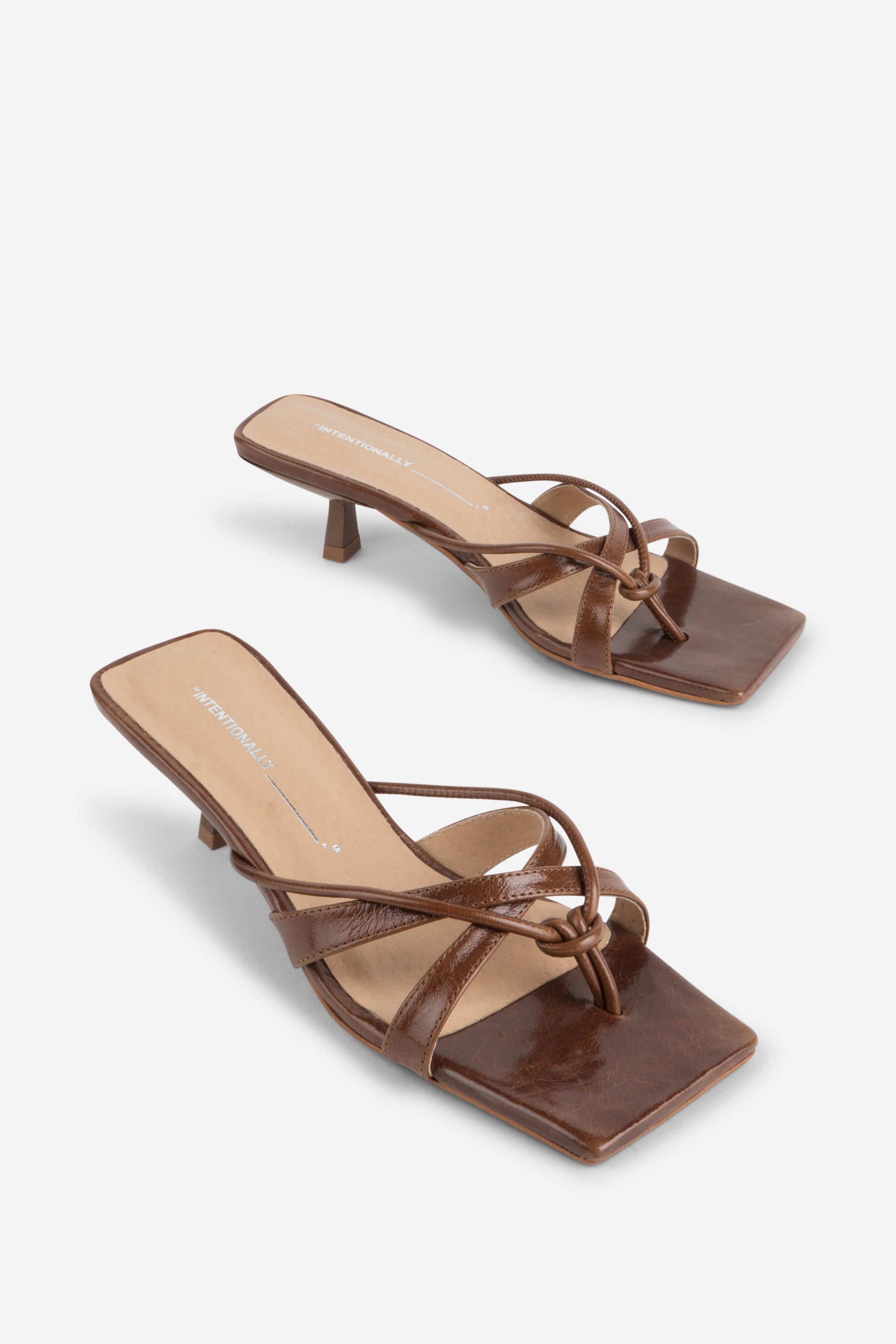 "INTENTIONALLY __________." ELI Kitten Heel Thong Sandal - Chestnut/Black/Pistachio