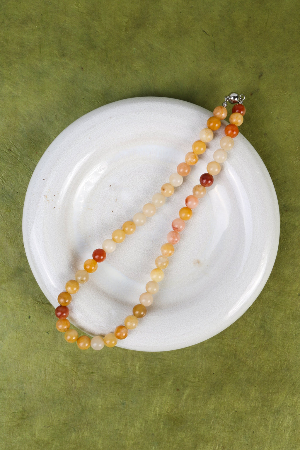 INTENTIONALLY __________. Eno Gemstone Necklace