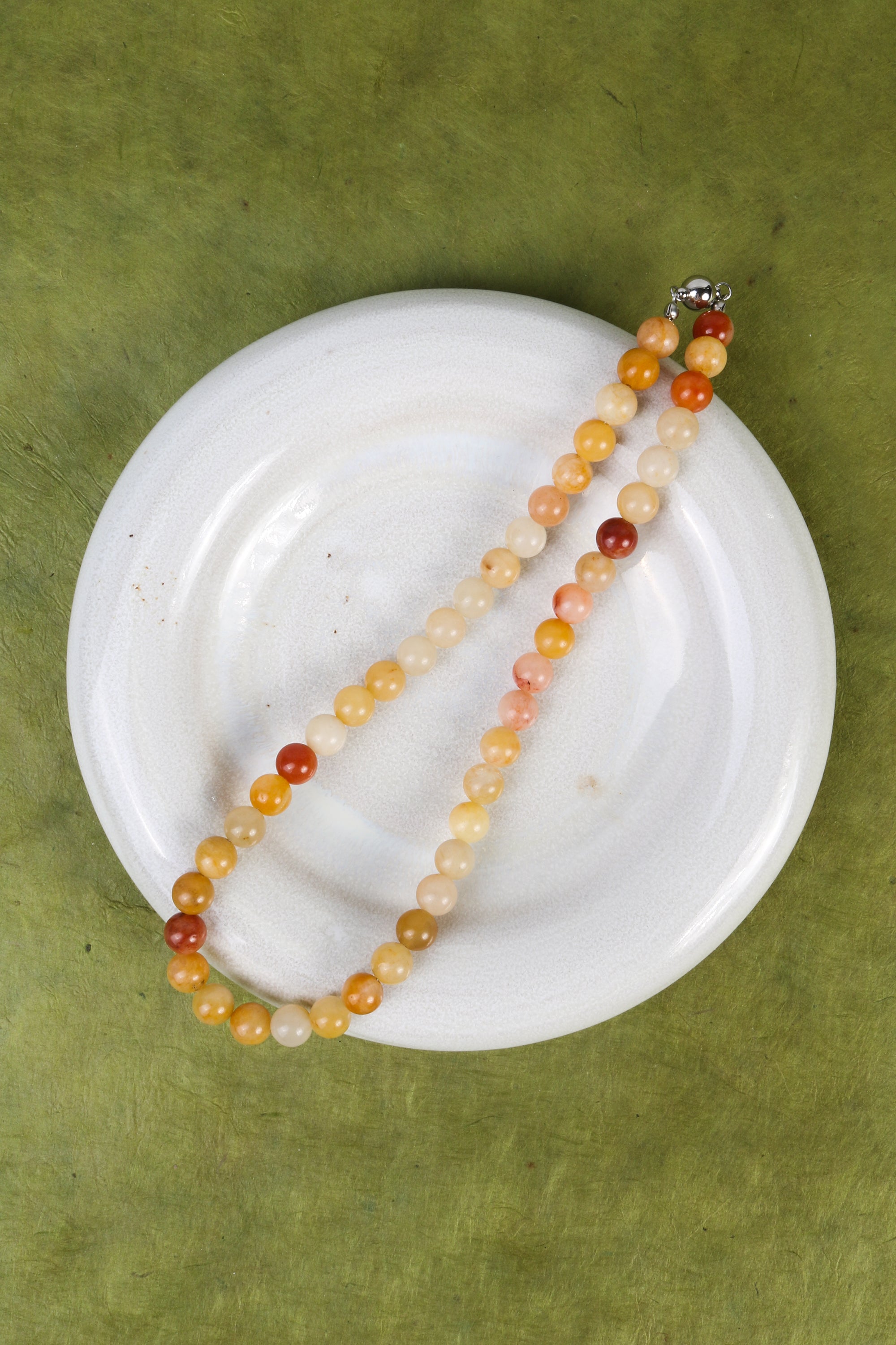 INTENTIONALLY __________. Eno Gemstone Necklace