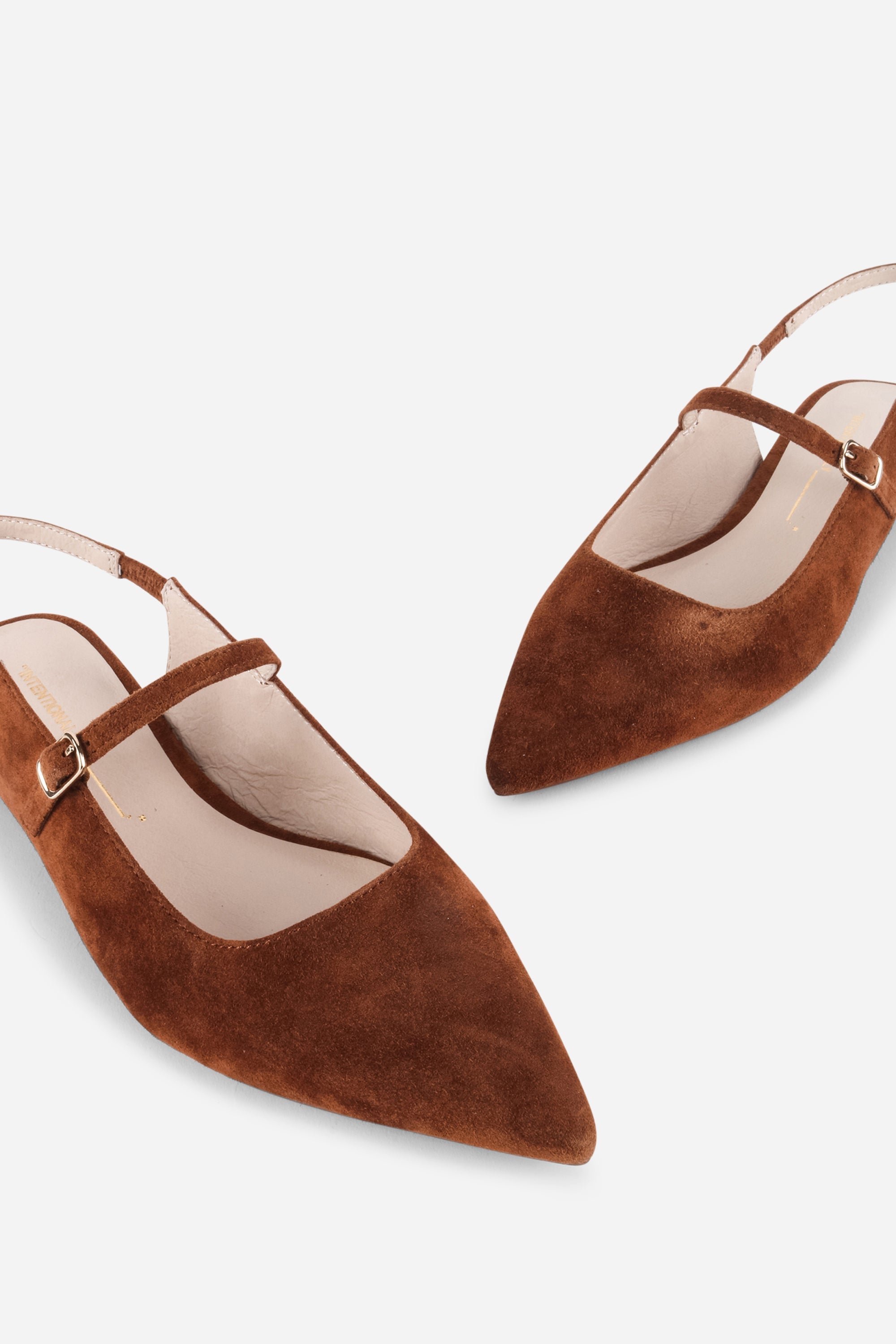 "INTENTIONALLY __________." Escape Slingback Flat