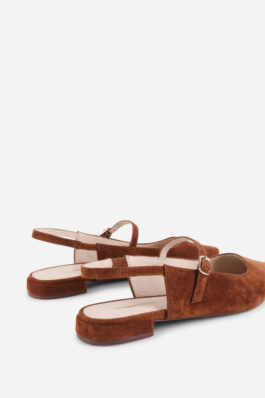 "INTENTIONALLY __________." Escape Slingback Flat