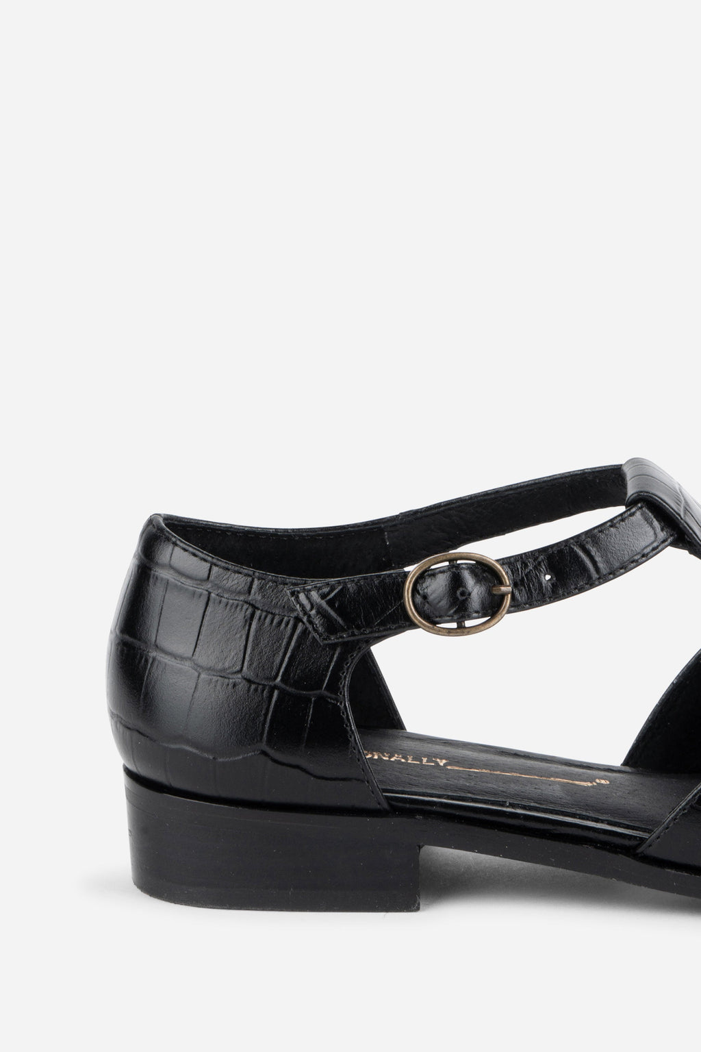 INTENTIONALLY __________. Eureka T-Strap Flat