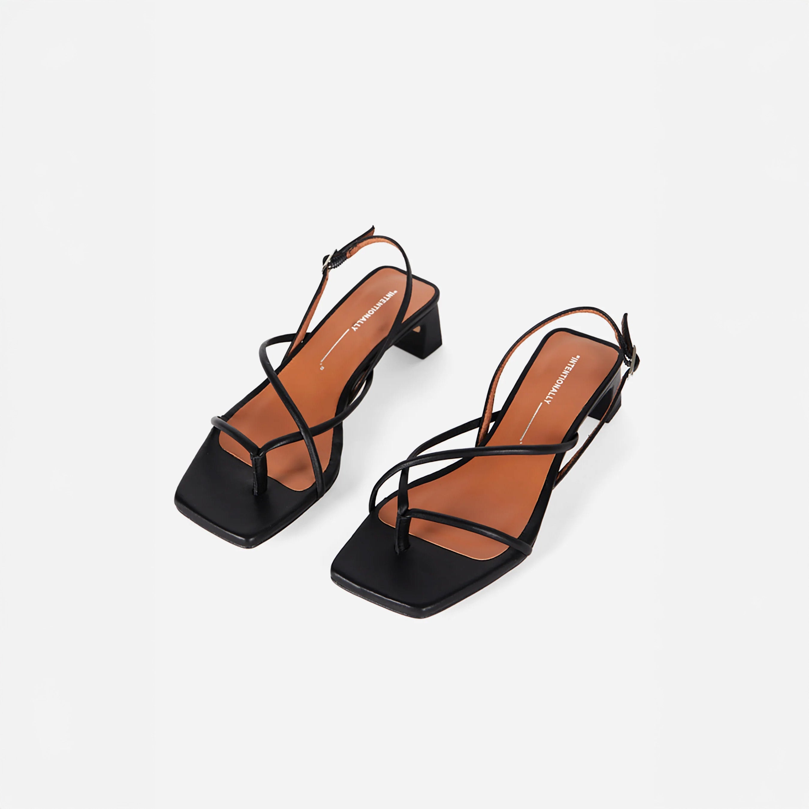 INTENTIONALLY __________. Fifi Sandals - Black
