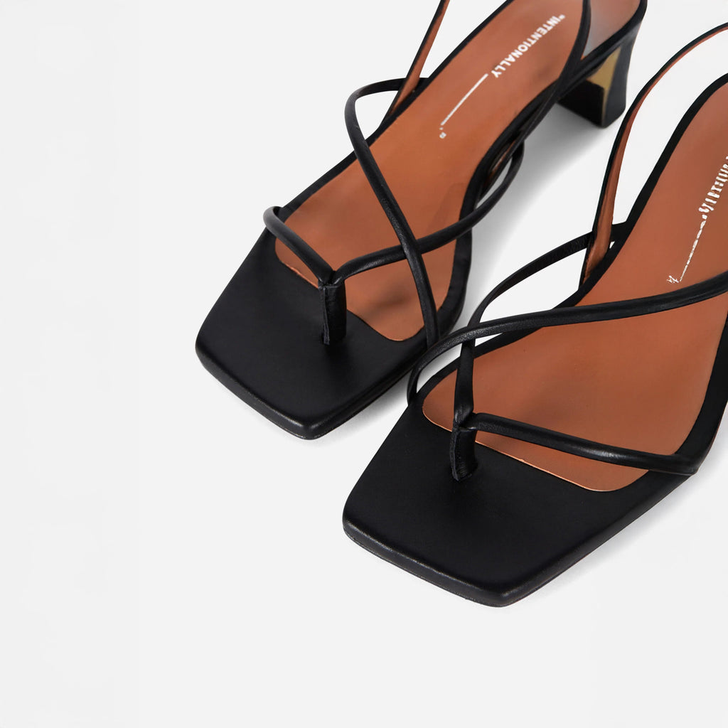 INTENTIONALLY __________. Fifi Sandals - Black