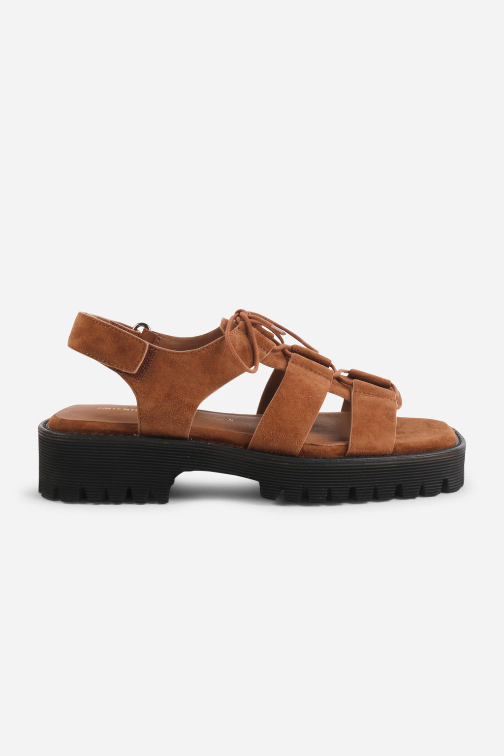 INTENTIONALLY __________. Hampton Flat Sandal