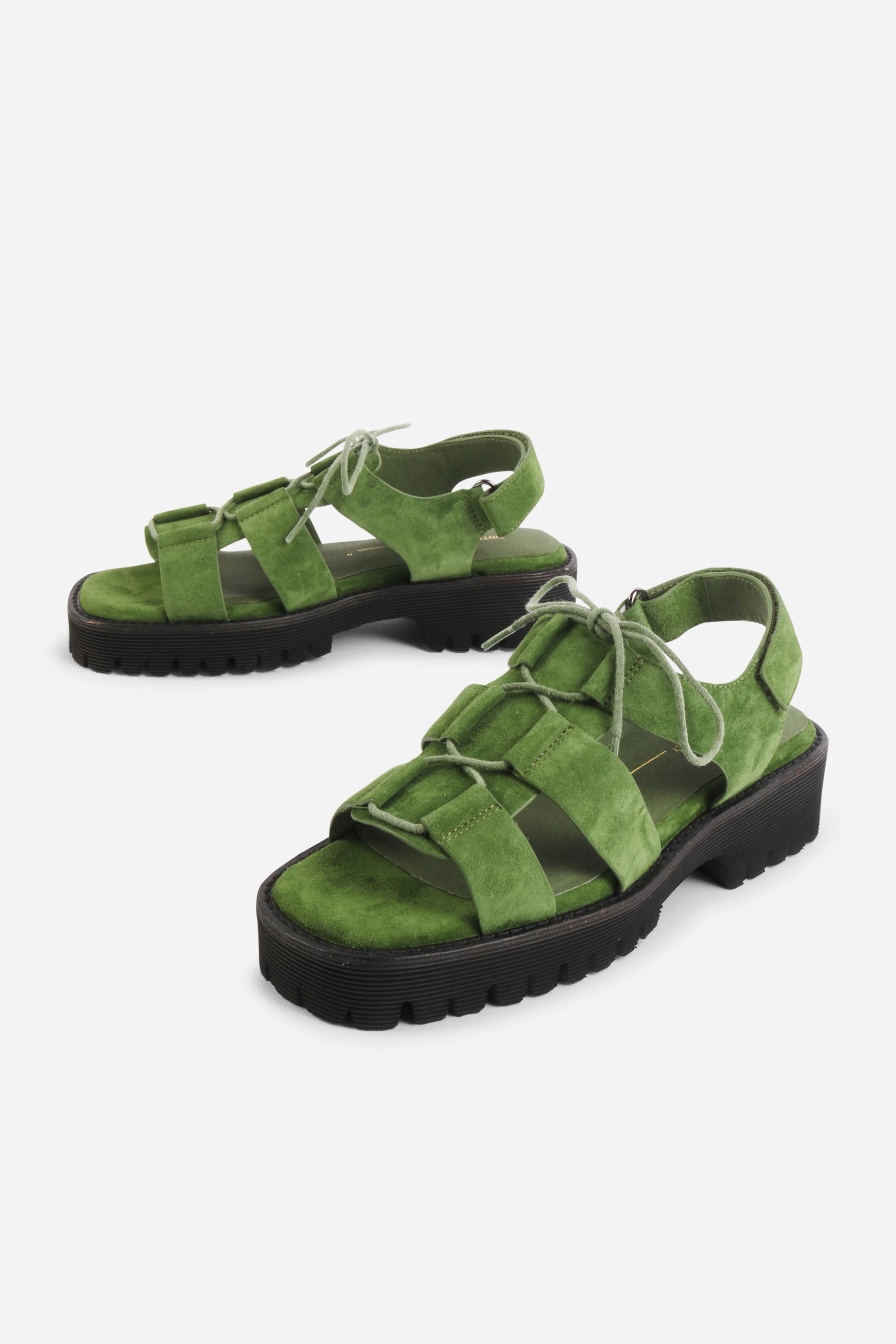 INTENTIONALLY __________. Hampton Flat Sandal