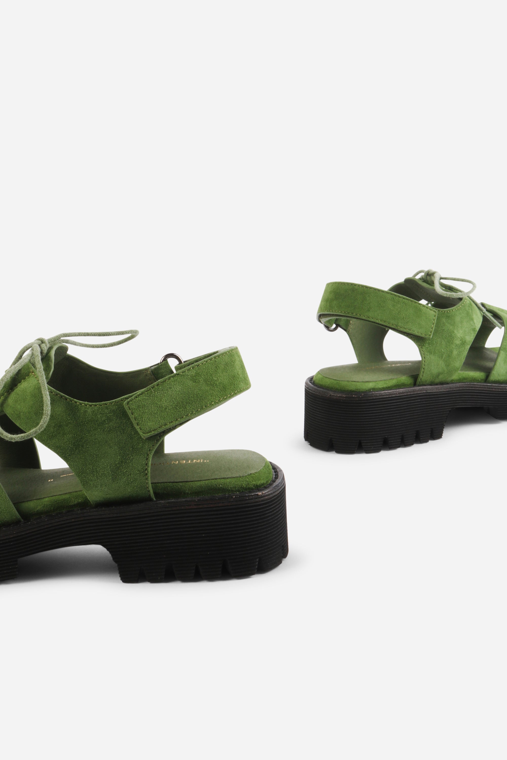 INTENTIONALLY __________. Hampton Flat Sandal