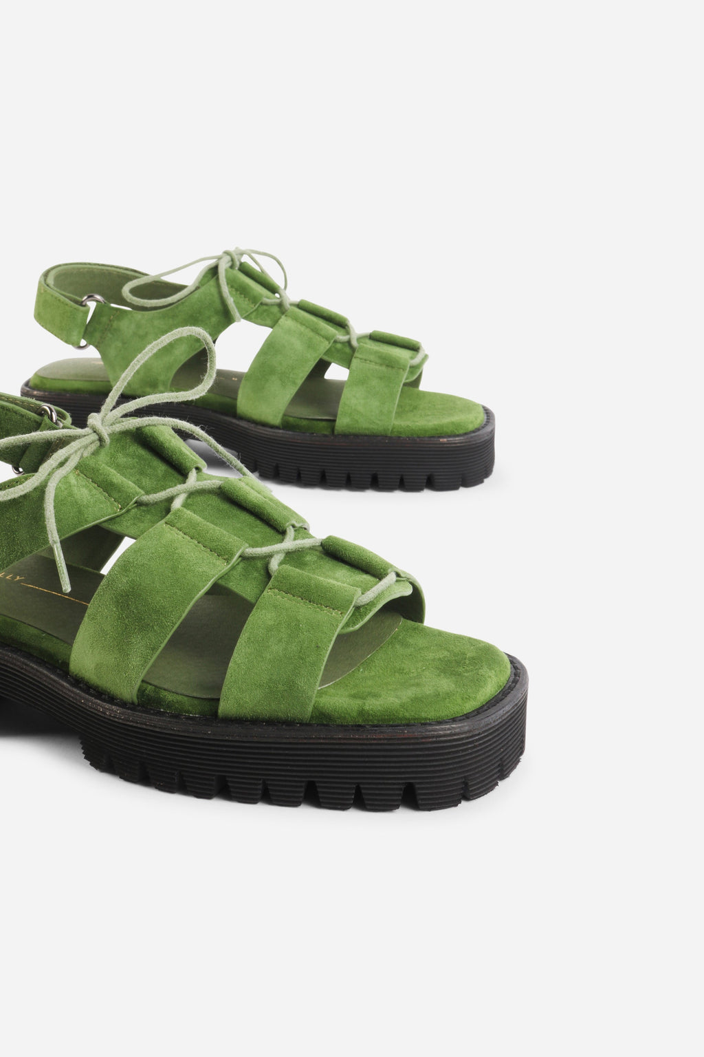 INTENTIONALLY __________. Hampton Flat Sandal