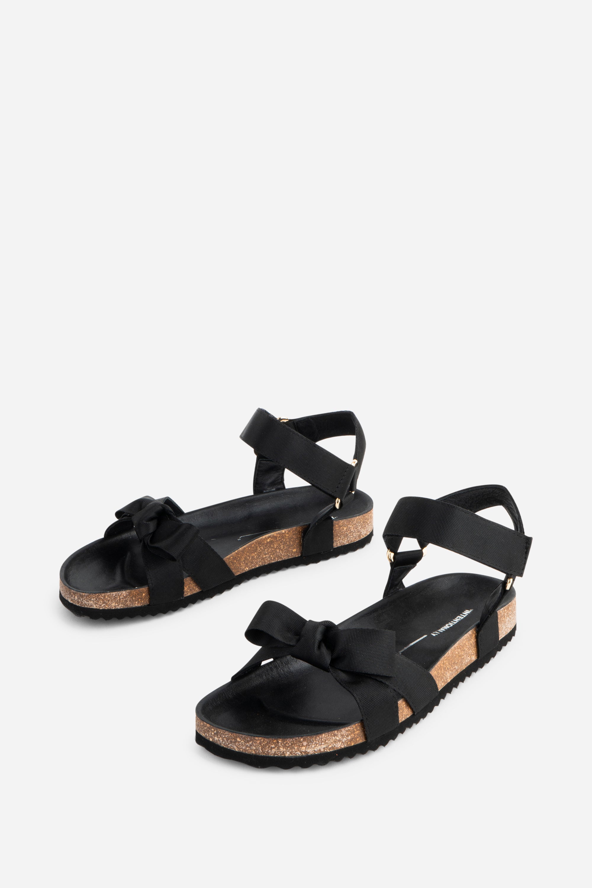 "INTENTIONALLY __________." Hoops Sandal