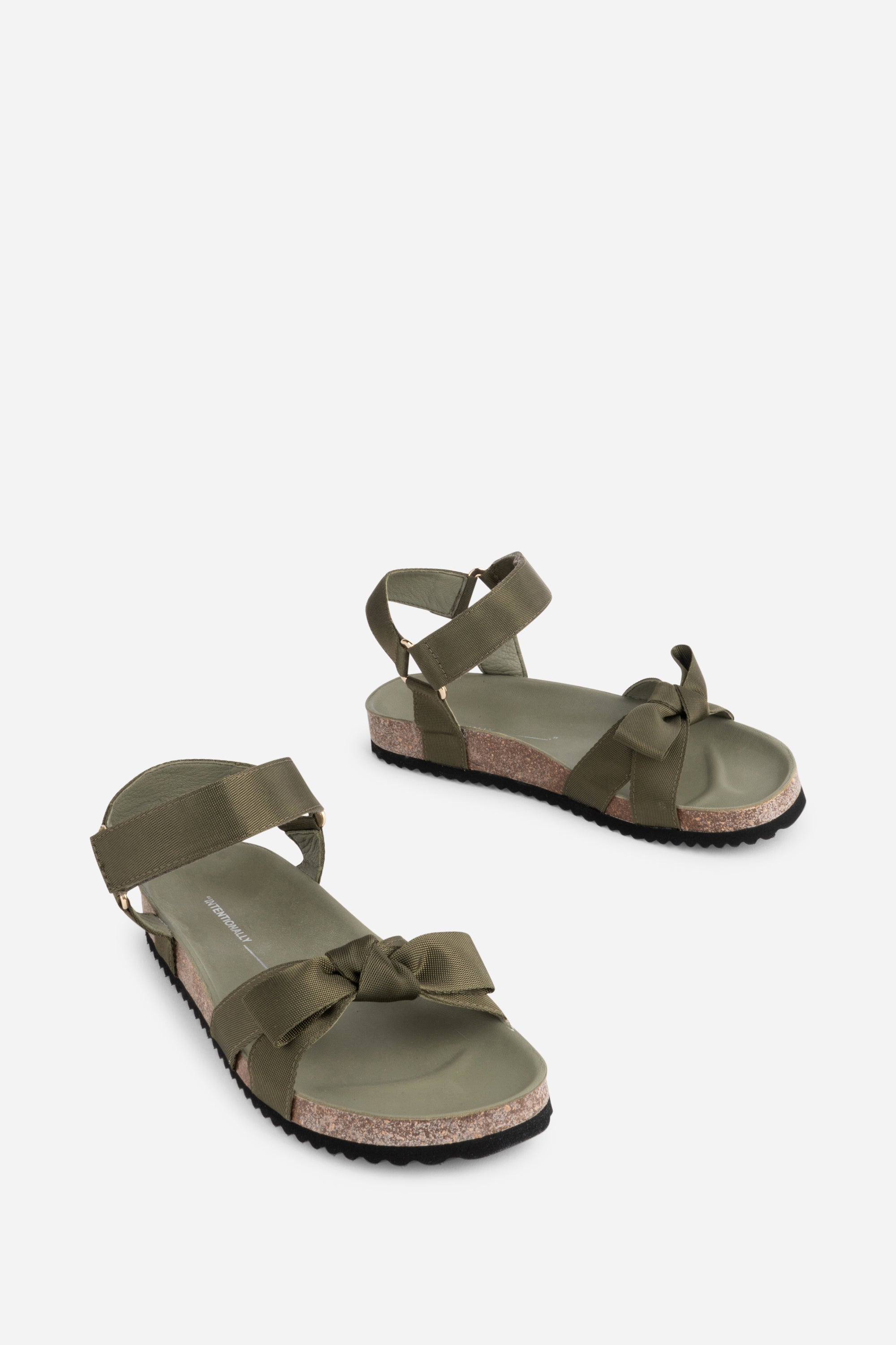 "INTENTIONALLY __________." Hoops Sandal