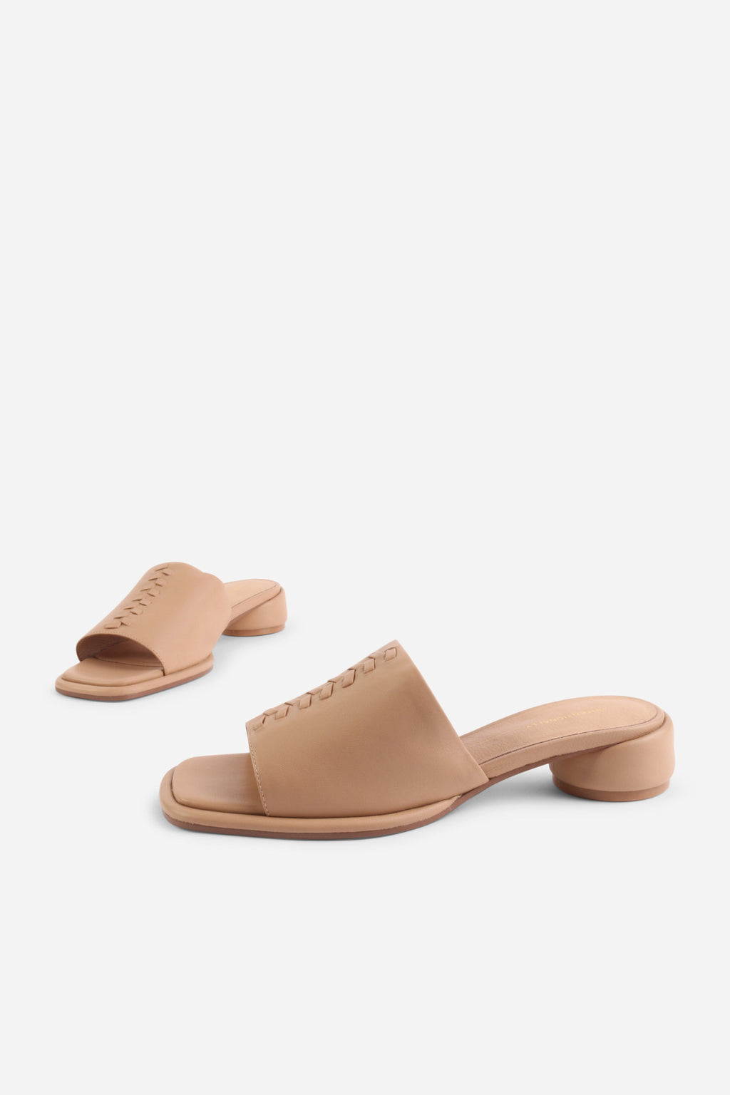 INTENTIONALLY __________. Imagine Leather Slide