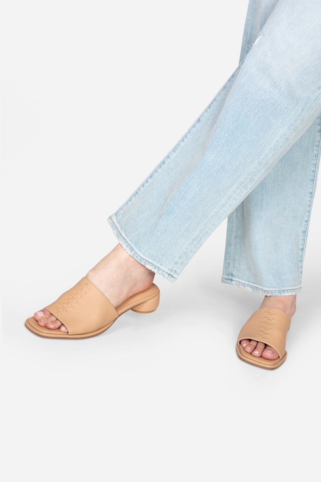 INTENTIONALLY __________. Imagine Leather Slide