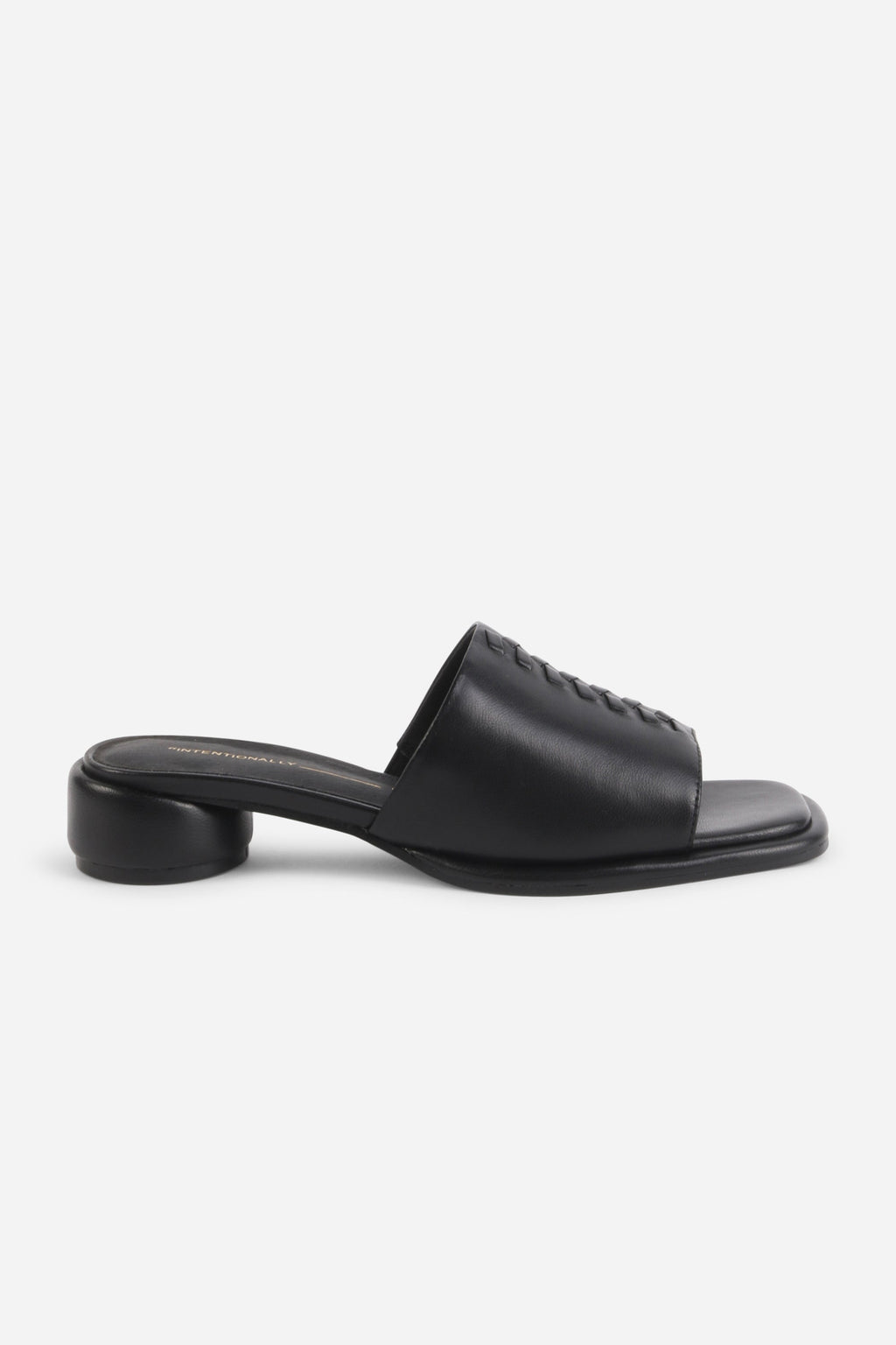 INTENTIONALLY __________. Imagine Leather Slide