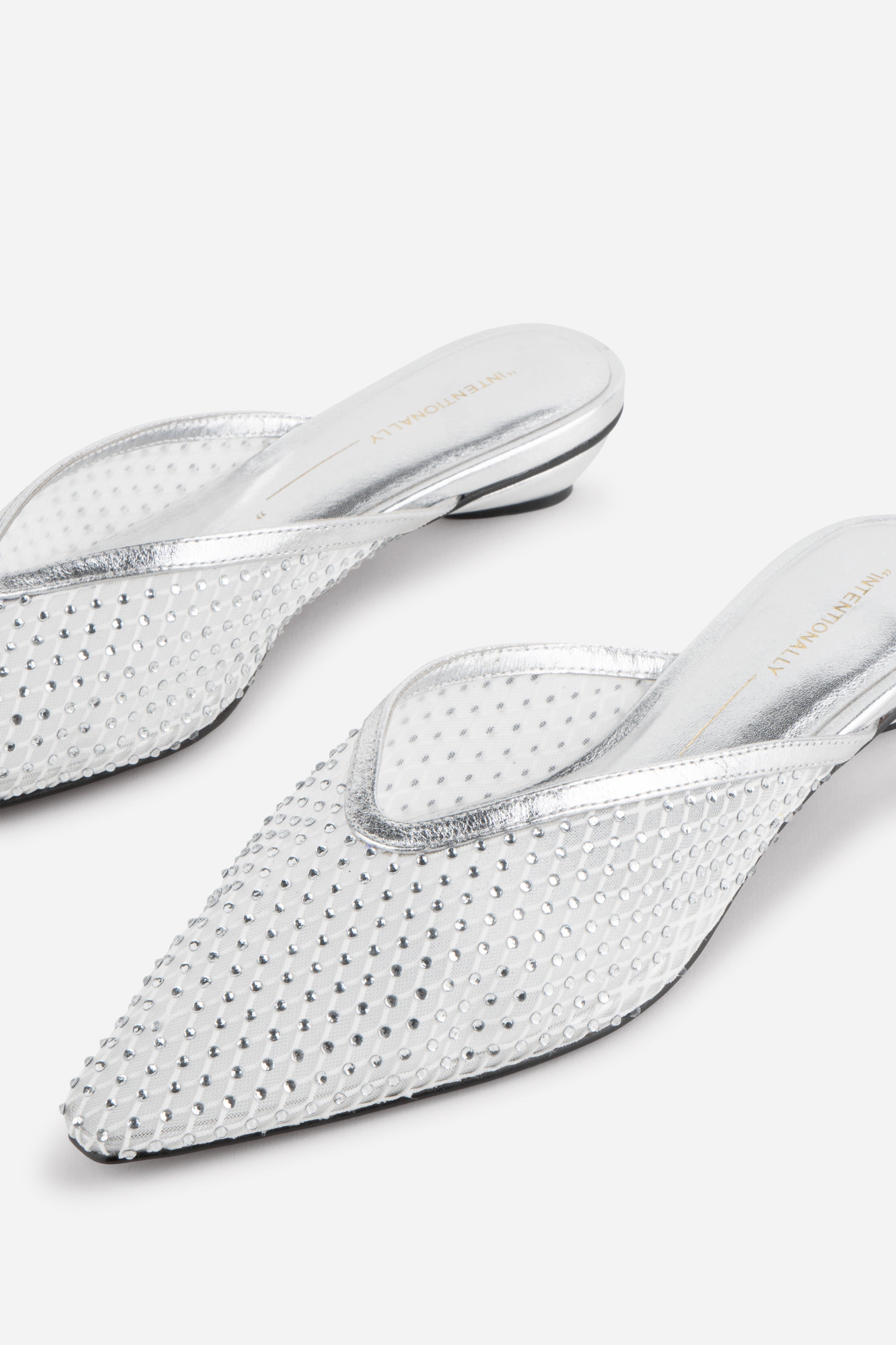 "INTENTIONALLY __________." Bibi Rhinestone Mesh Mule