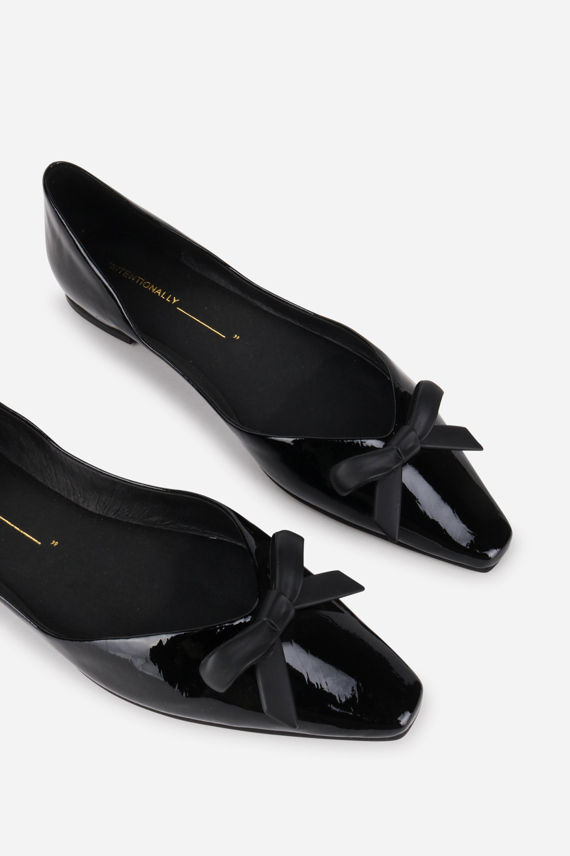"INTENTIONALLY __________." Cecilia Patent Ballet Flat - Black