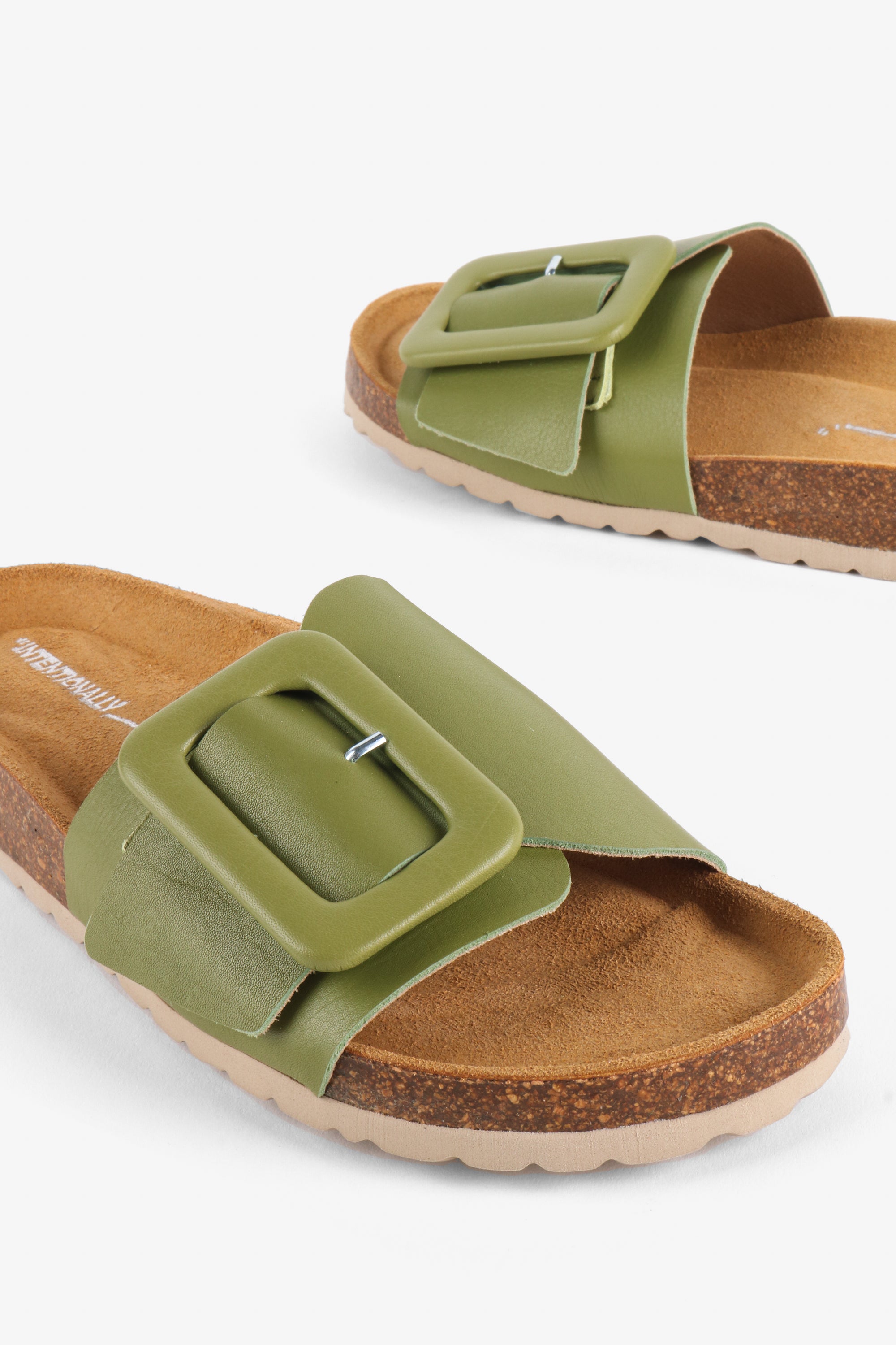 "INTENTIONALLY __________." Clarice Sandal