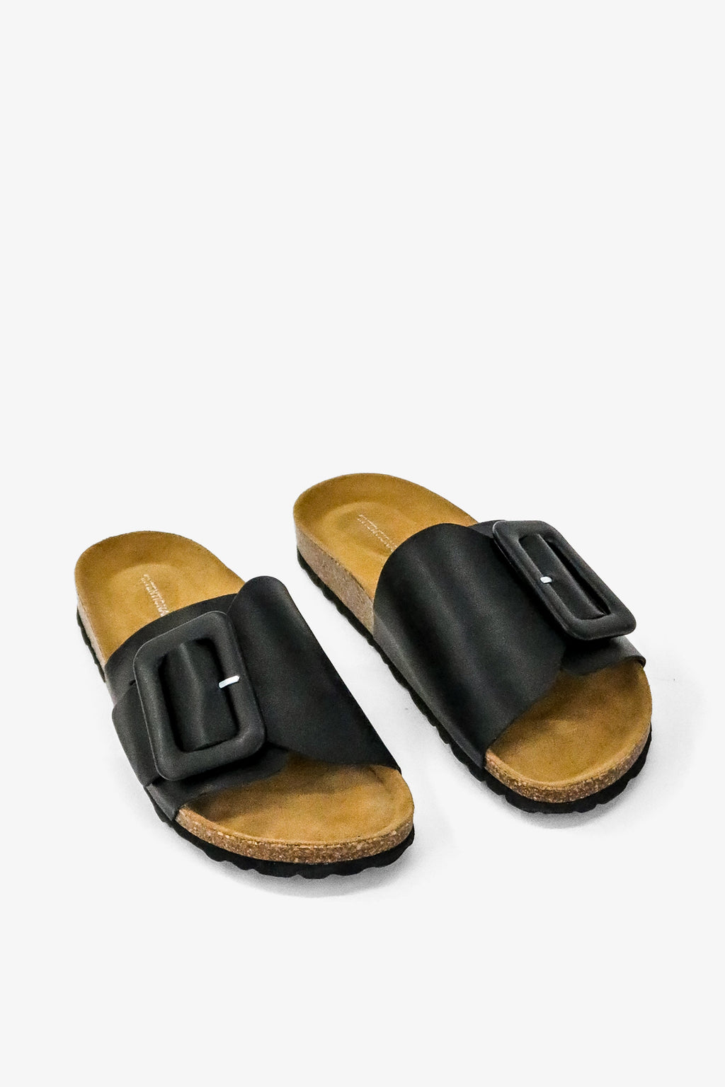 "INTENTIONALLY __________." Clarice Sandal