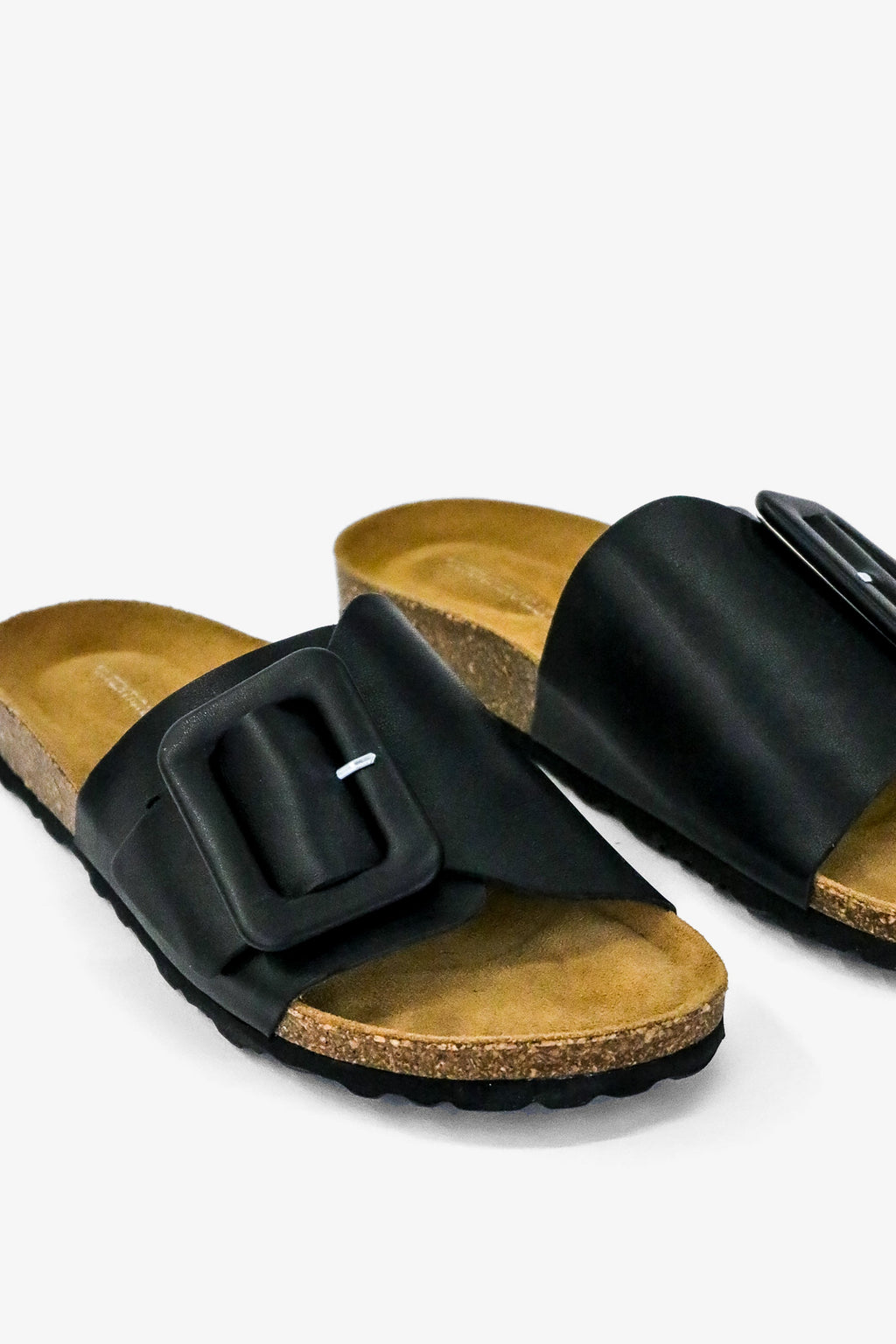 "INTENTIONALLY __________." Clarice Sandal