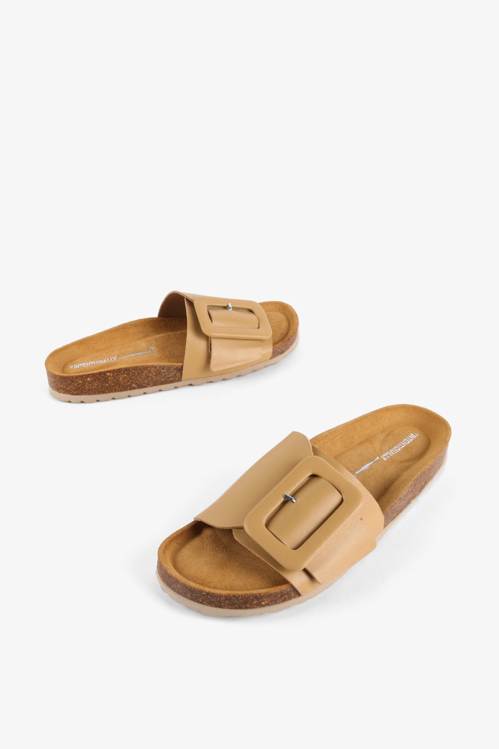 "INTENTIONALLY __________." Clarice Sandal