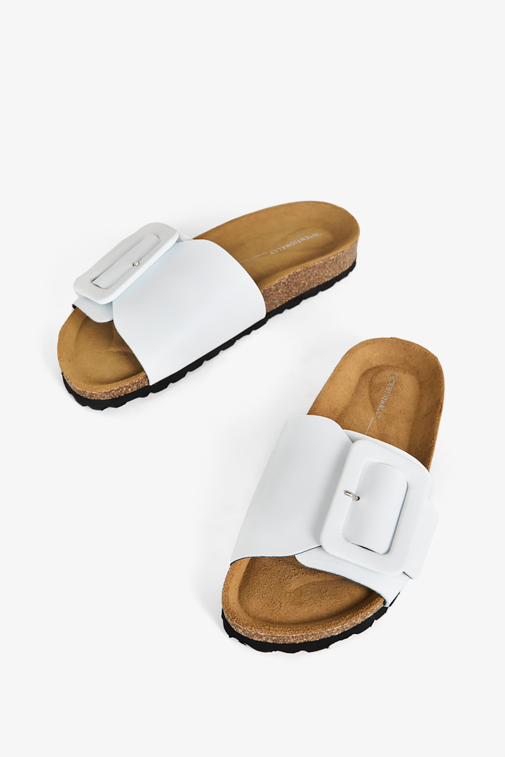 "INTENTIONALLY __________." Clarice Sandal