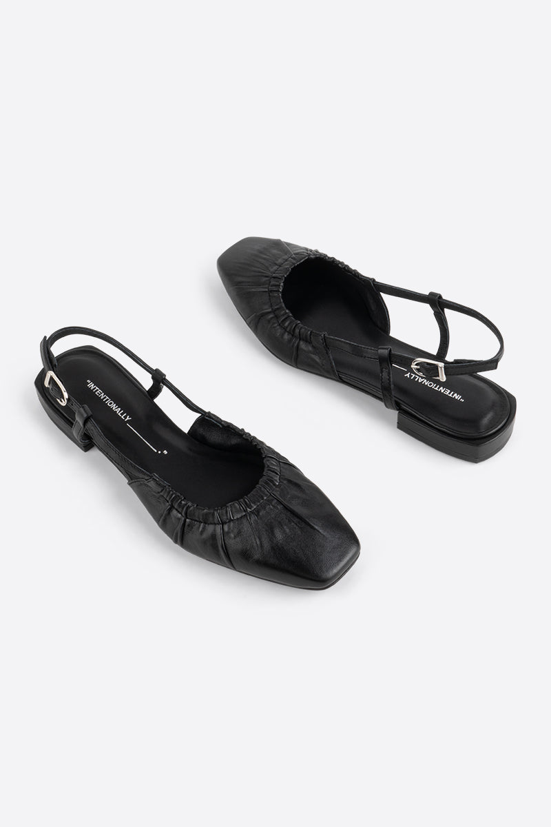 "INTENTIONALLY __________." DAFF SLINGBACK FLAT - Black/Cream