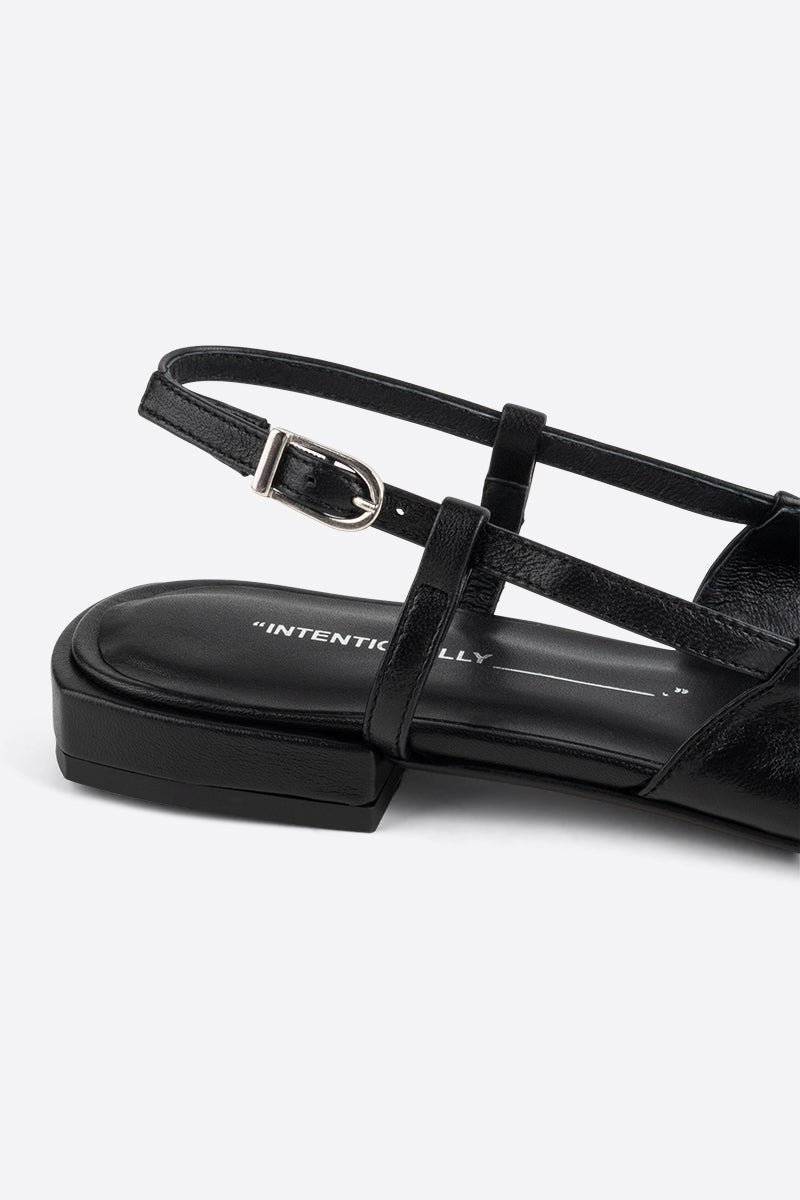 "INTENTIONALLY __________." DAFF SLINGBACK FLAT - Black/Cream