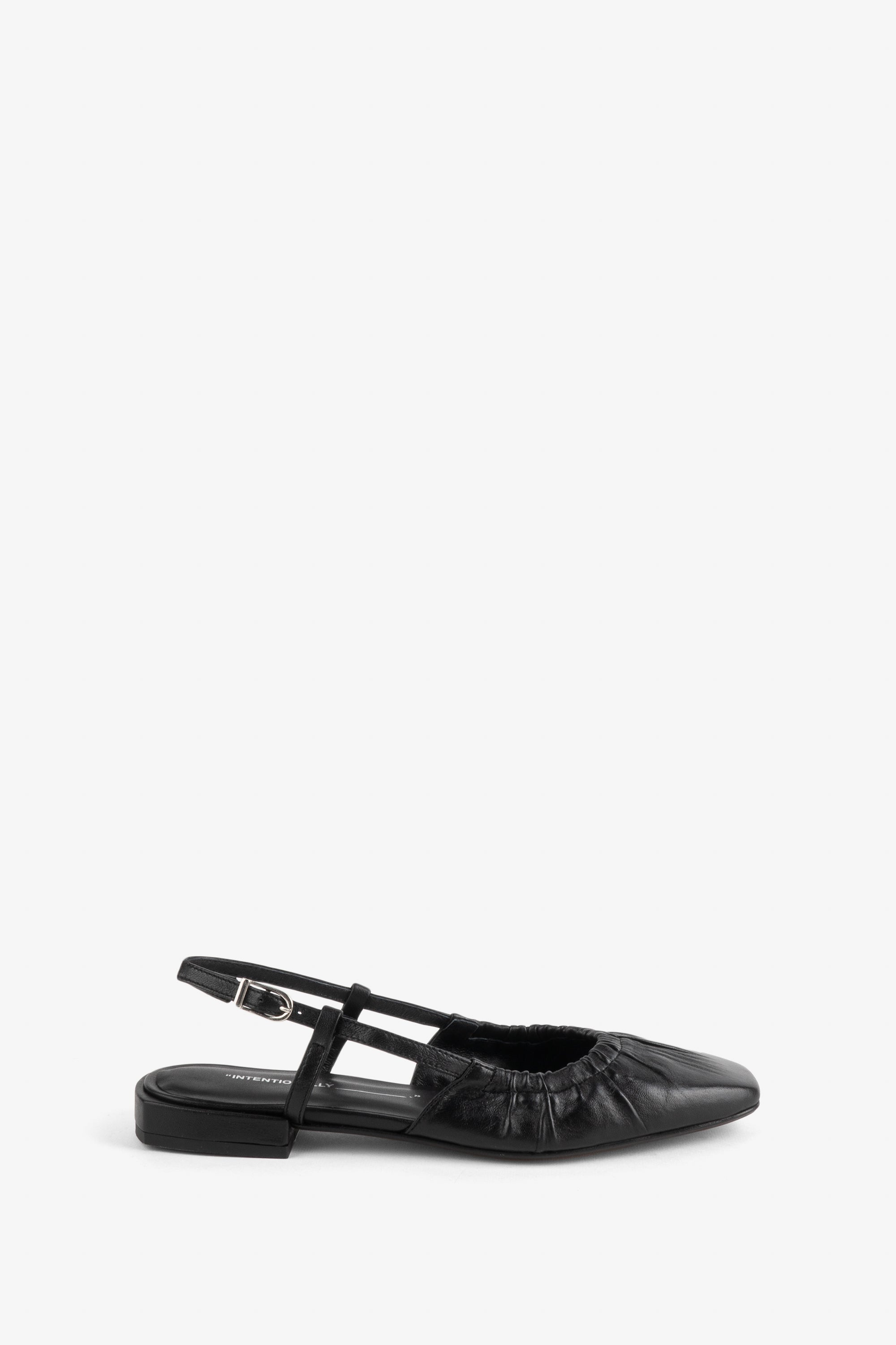 "INTENTIONALLY __________." DAFF SLINGBACK FLAT - Black/Cream