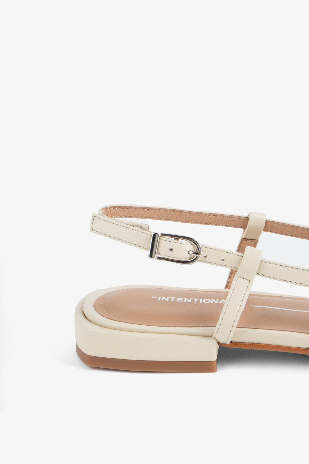 "INTENTIONALLY __________." DAFF SLINGBACK FLAT - Black/Cream