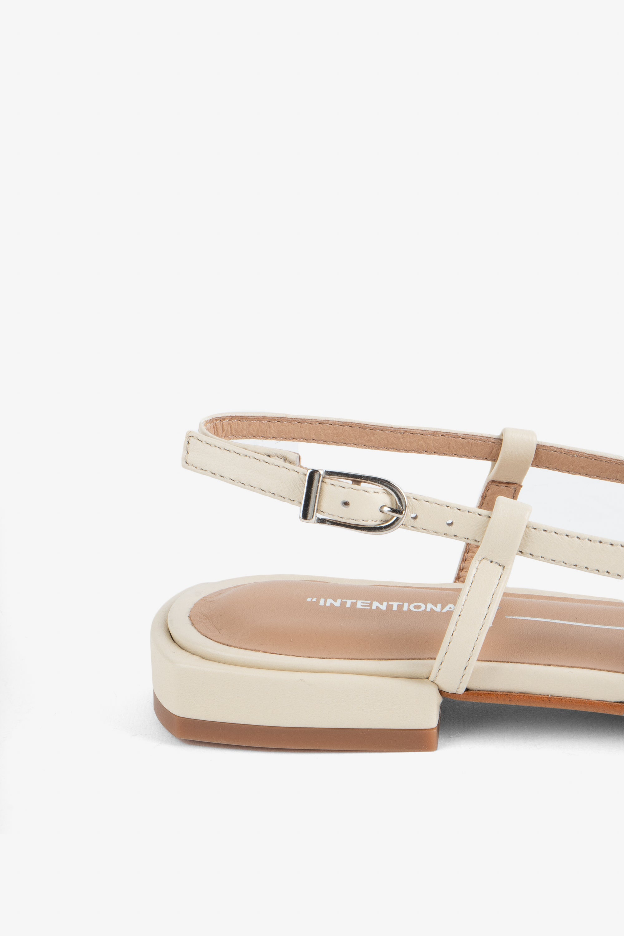 "INTENTIONALLY __________." DAFF SLINGBACK FLAT - Black/Cream