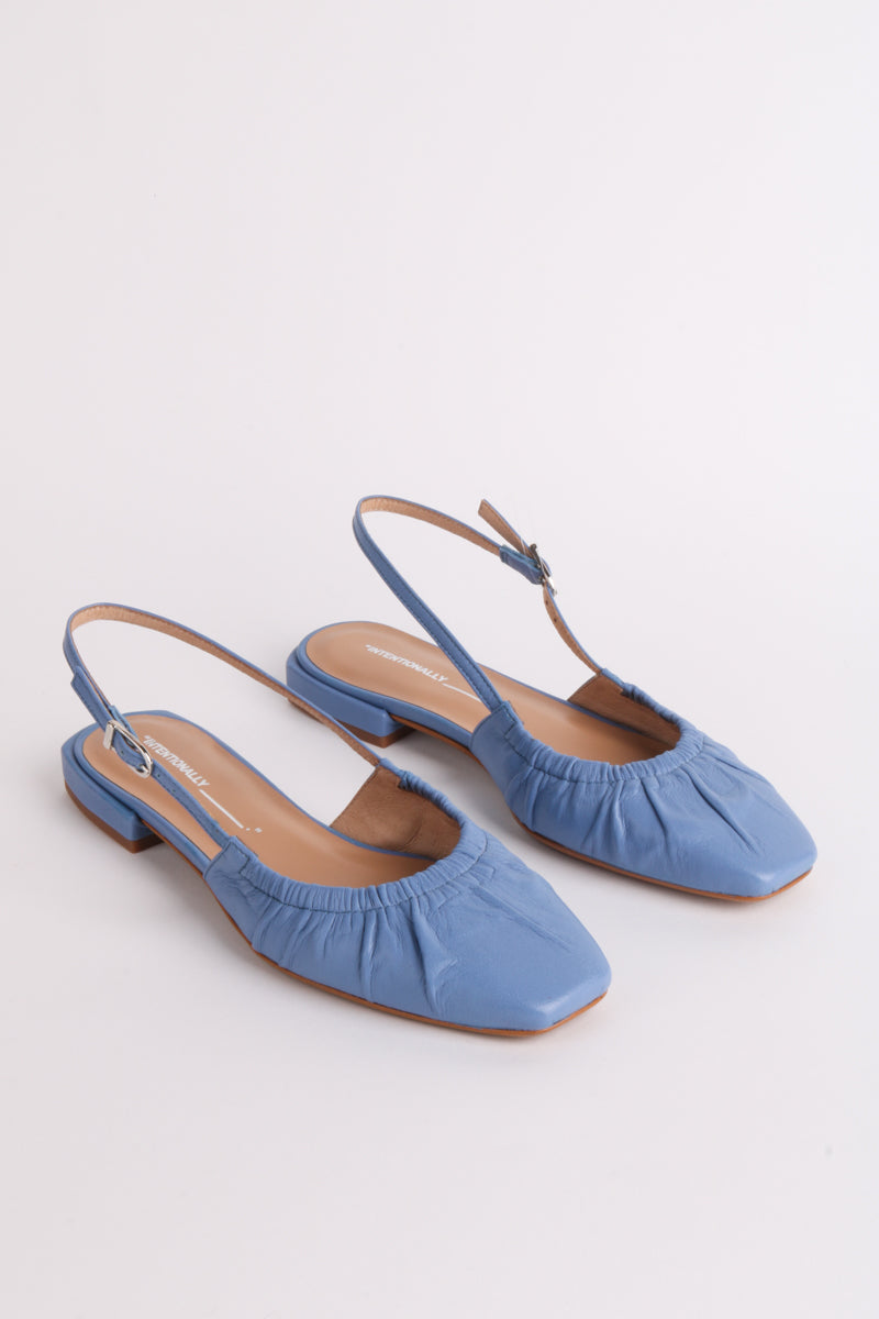 "INTENTIONALLY __________." DAFF SLINGBACK FLAT - Black/Cream