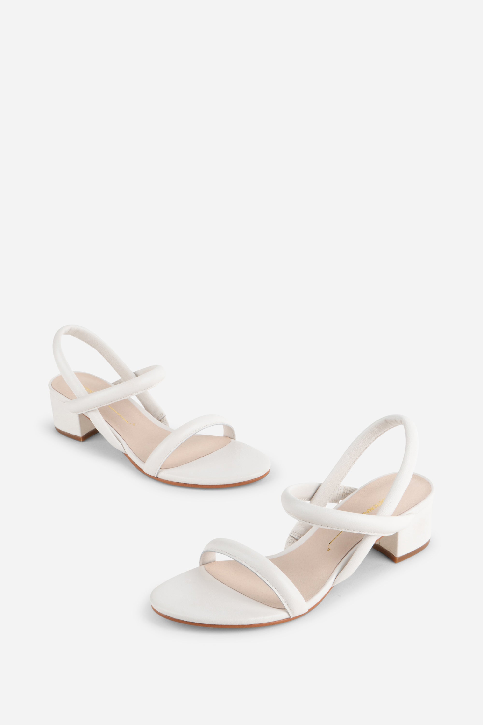 "INTENTIONALLY __________." KIMI HEEL - black
