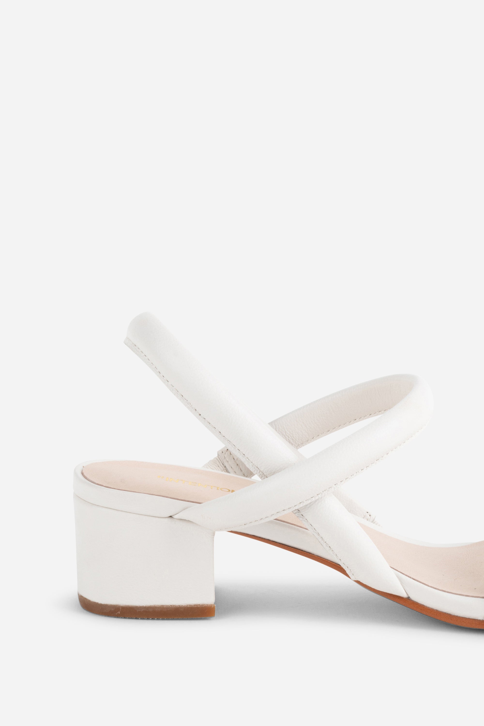 "INTENTIONALLY __________." KIMI HEEL - black