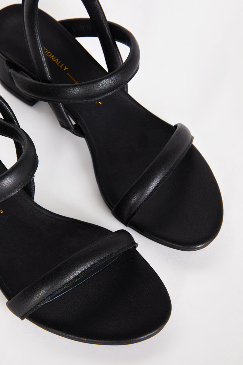 "INTENTIONALLY __________." KIMI HEEL - black