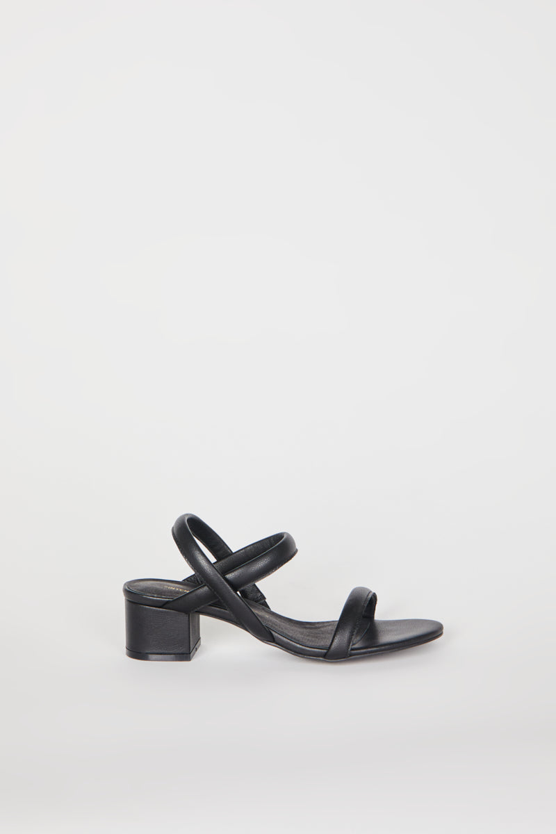 "INTENTIONALLY __________." KIMI HEEL - black
