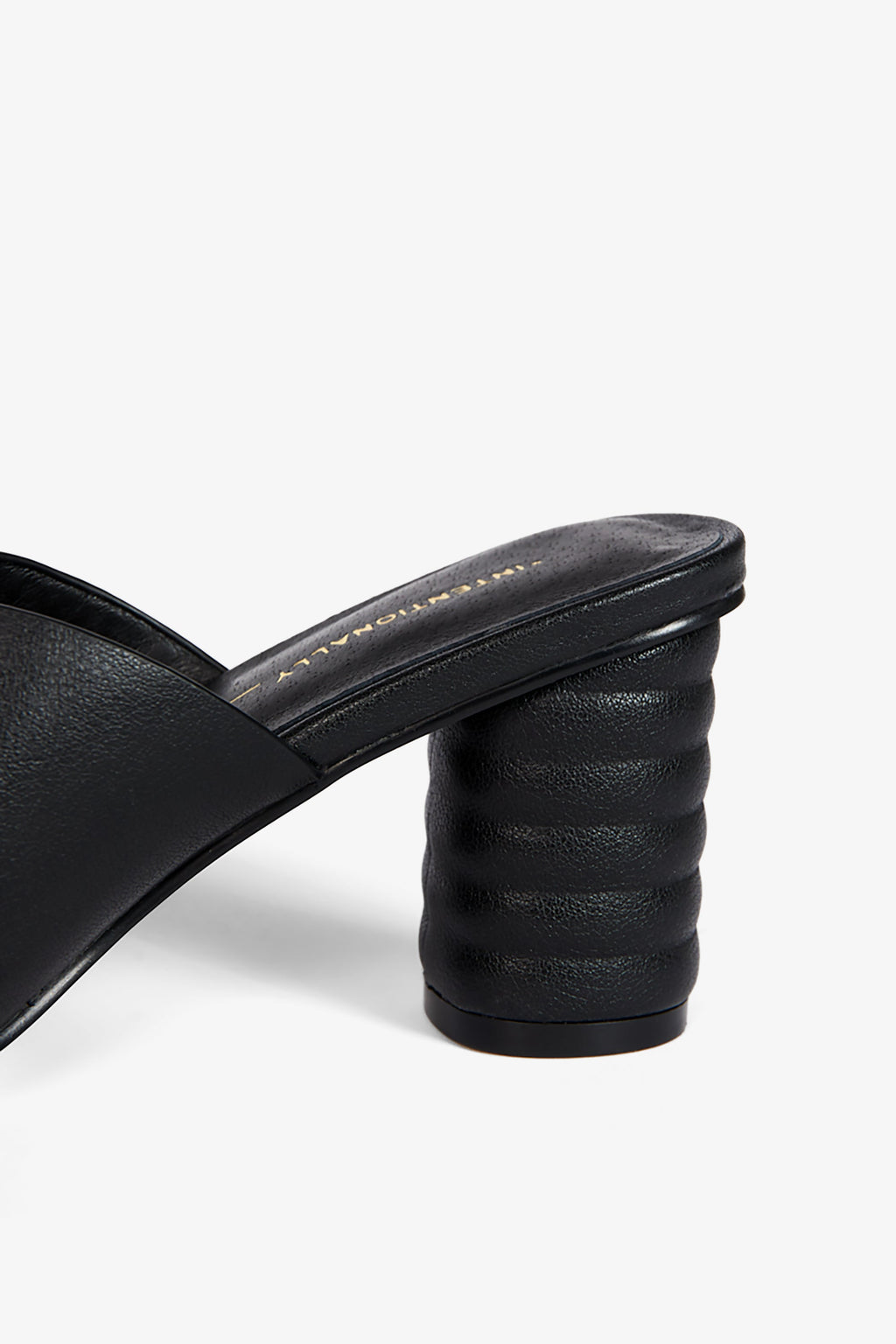 "INTENTIONALLY __________." Kamika Heel - Multi