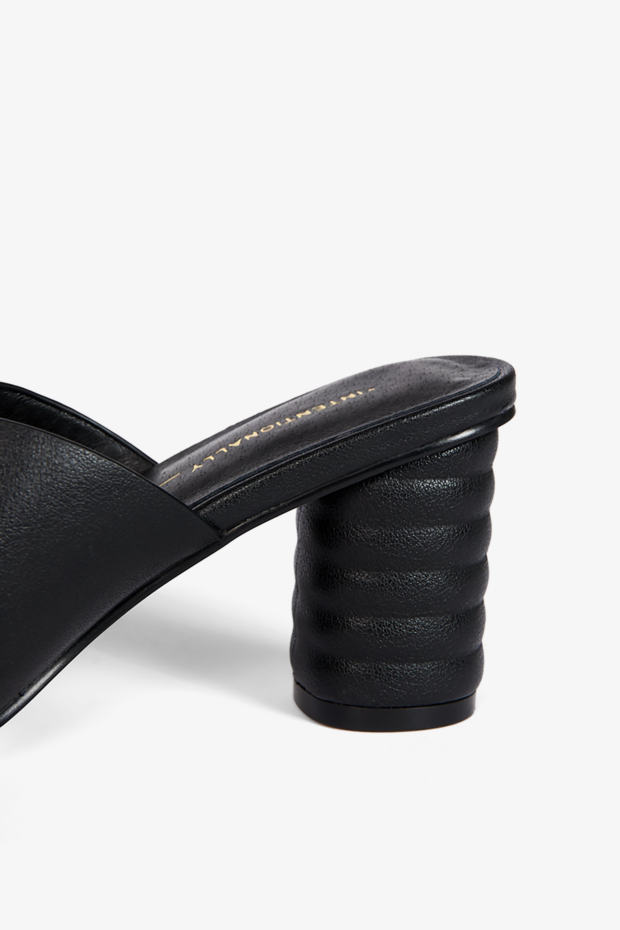 "INTENTIONALLY __________." Kamika Heel - Multi
