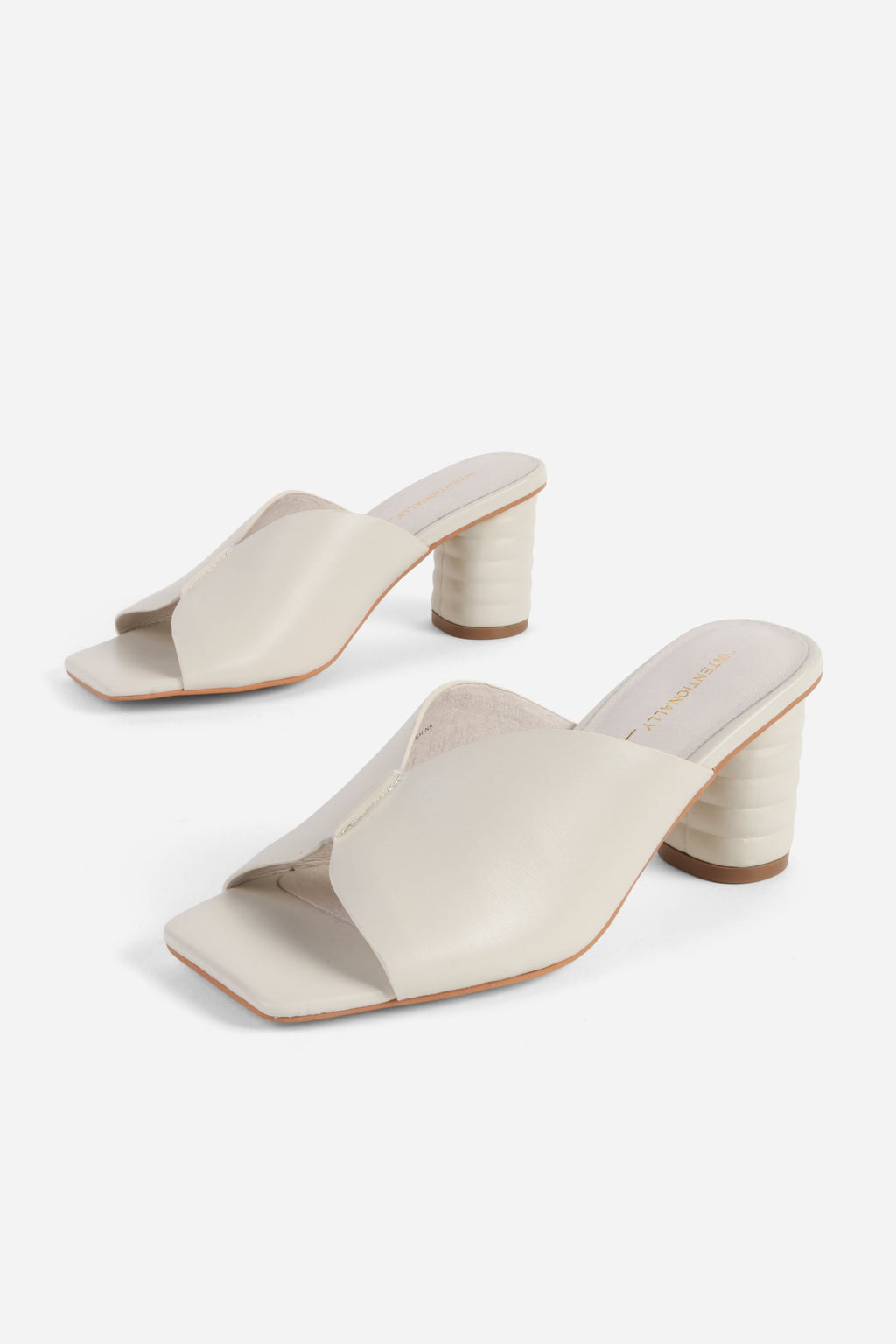 "INTENTIONALLY __________." Kamika Heel - Multi
