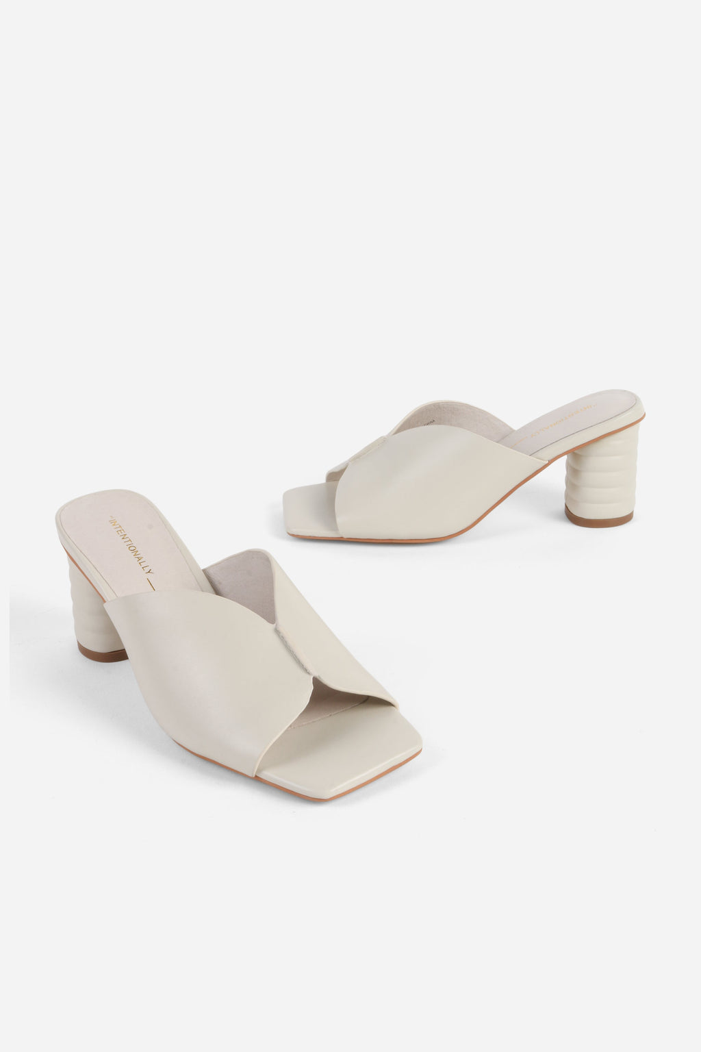 "INTENTIONALLY __________." Kamika Heel - Multi