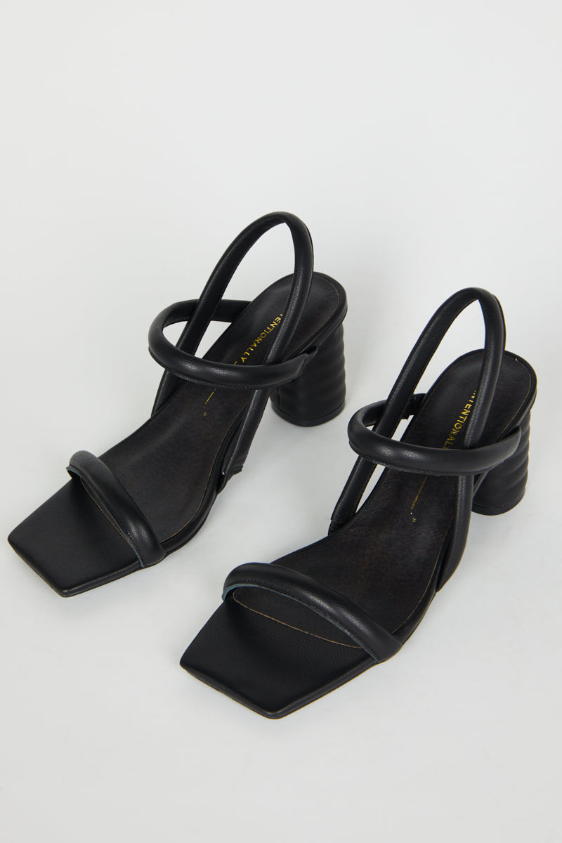 "INTENTIONALLY __________." Kifton Heel - Multi