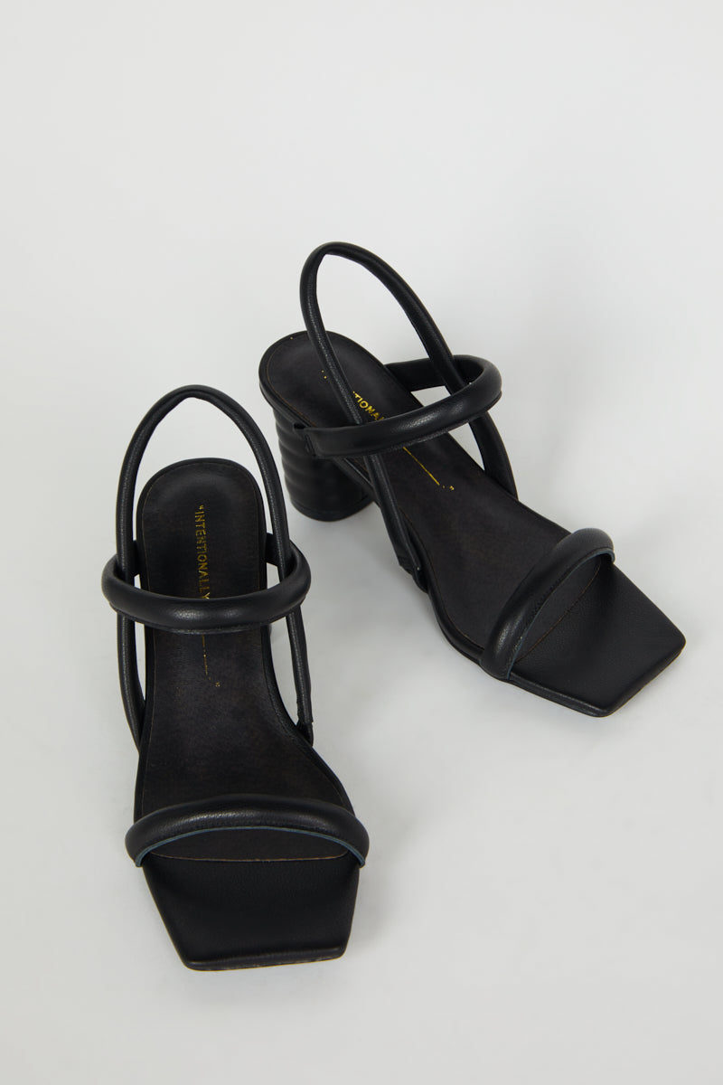 "INTENTIONALLY __________." Kifton Heel - Multi