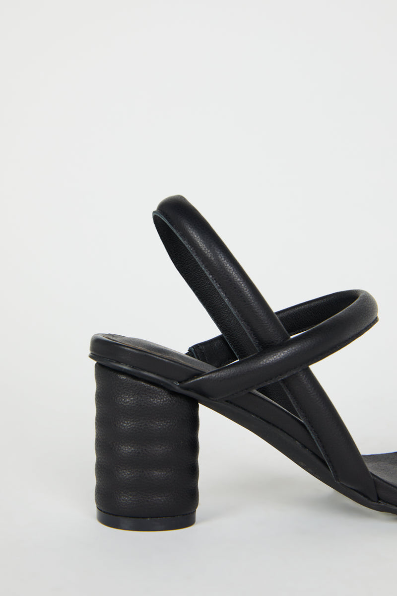 "INTENTIONALLY __________." Kifton Heel - Multi