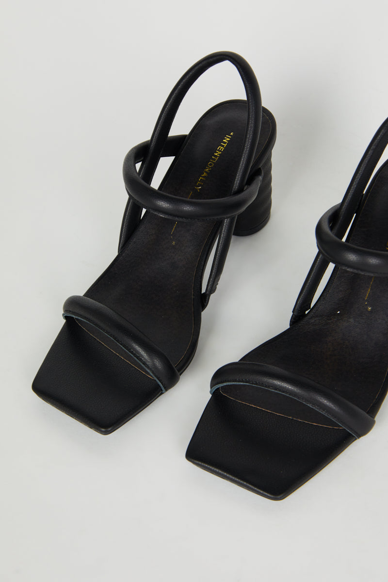 "INTENTIONALLY __________." Kifton Heel - Multi