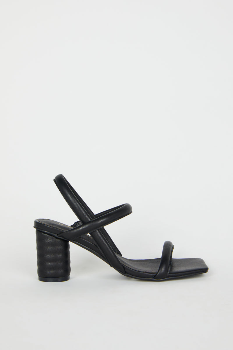 "INTENTIONALLY __________." Kifton Heel - Multi