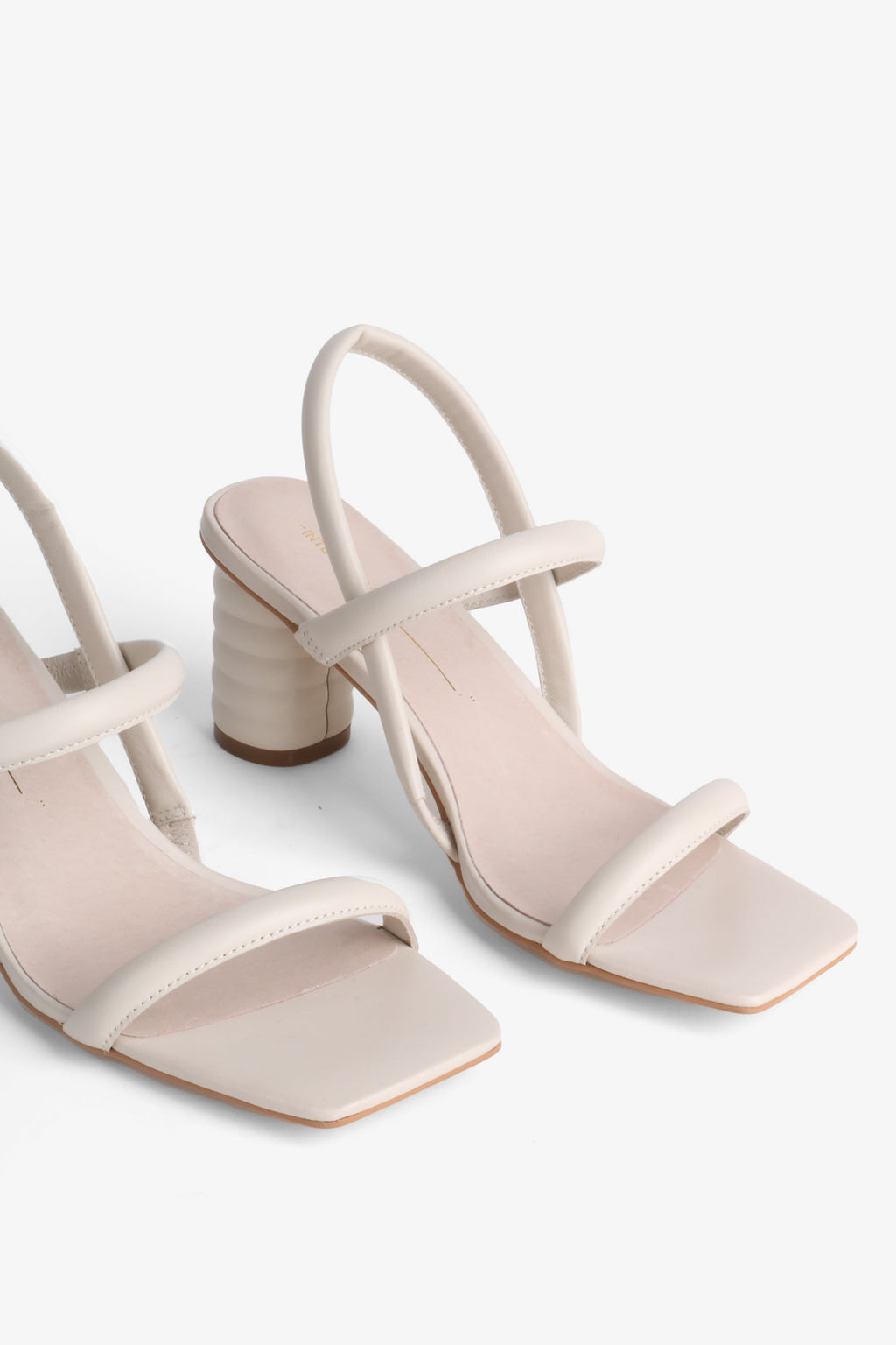 "INTENTIONALLY __________." Kifton Heel - Multi