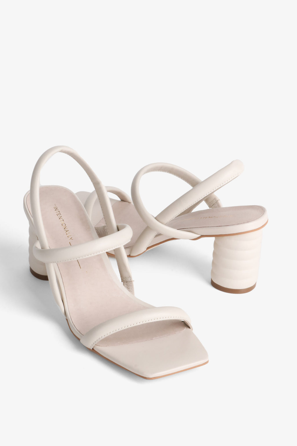 "INTENTIONALLY __________." Kifton Heel - Multi