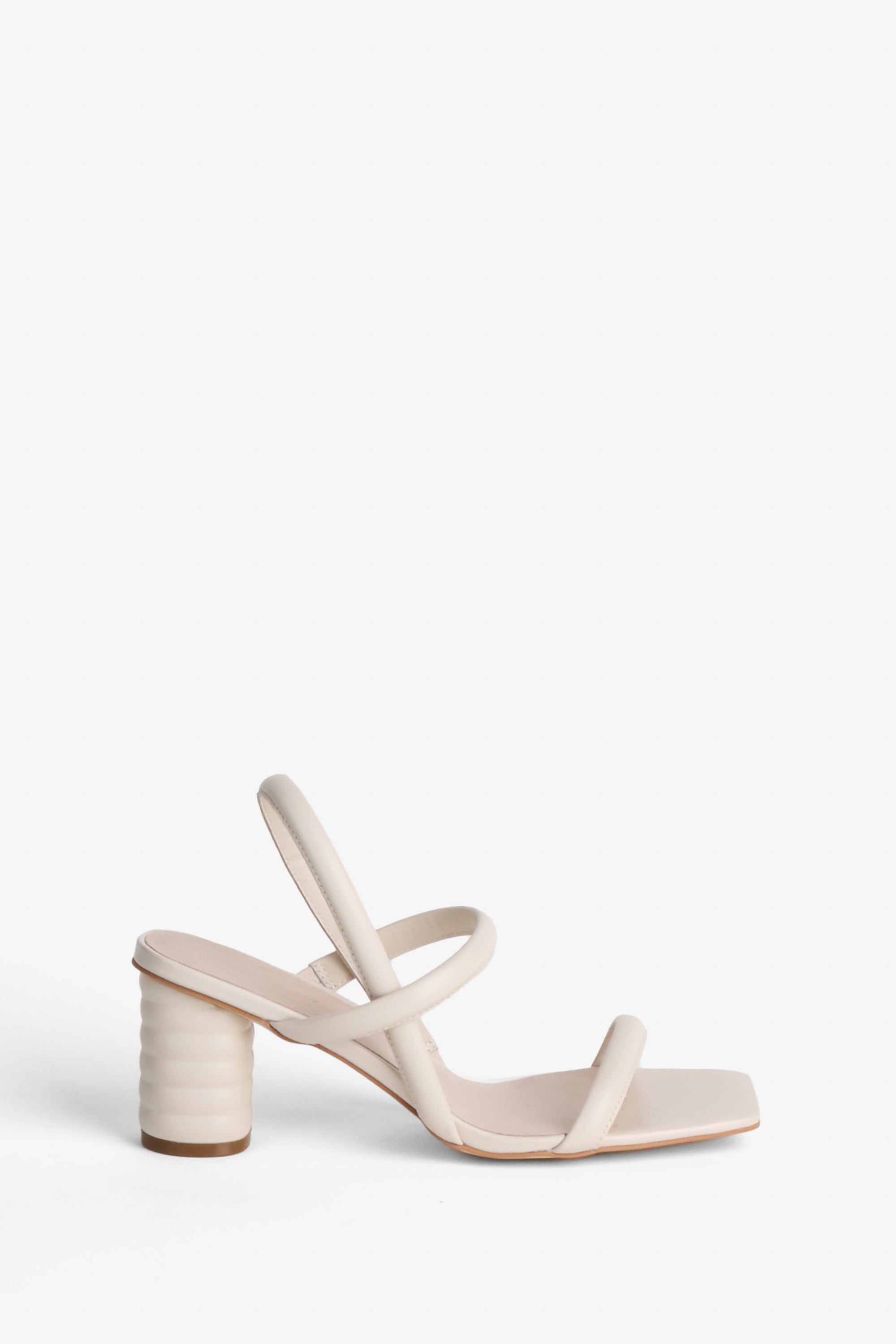 "INTENTIONALLY __________." Kifton Heel - Multi
