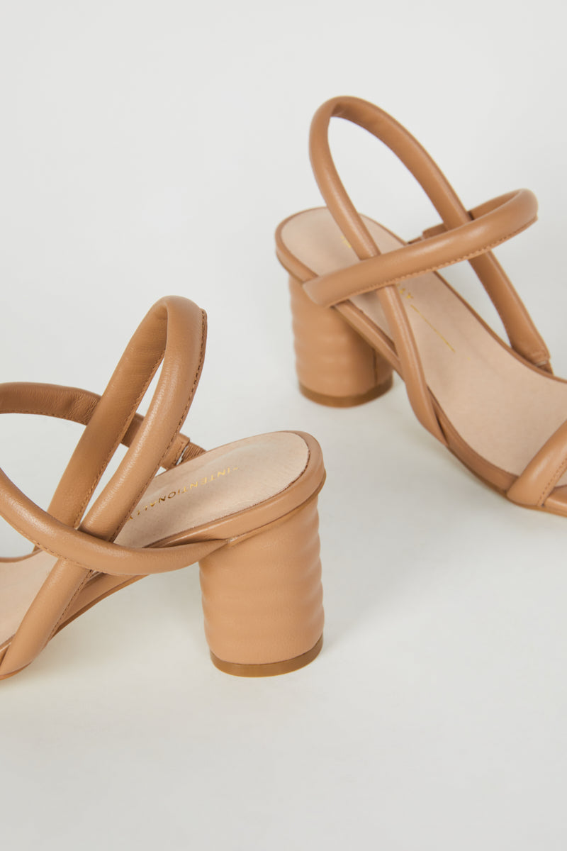 "INTENTIONALLY __________." Kifton Heel - Multi