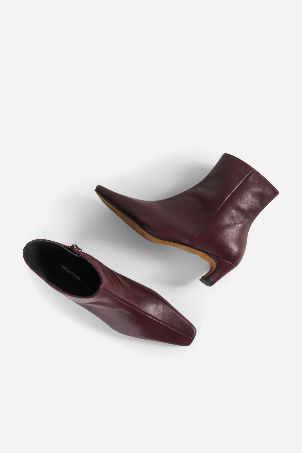 "INTENTIONALLY __________." LEXI KITTEN HEEL ANKLE BOOT - OATMILK/BLACK